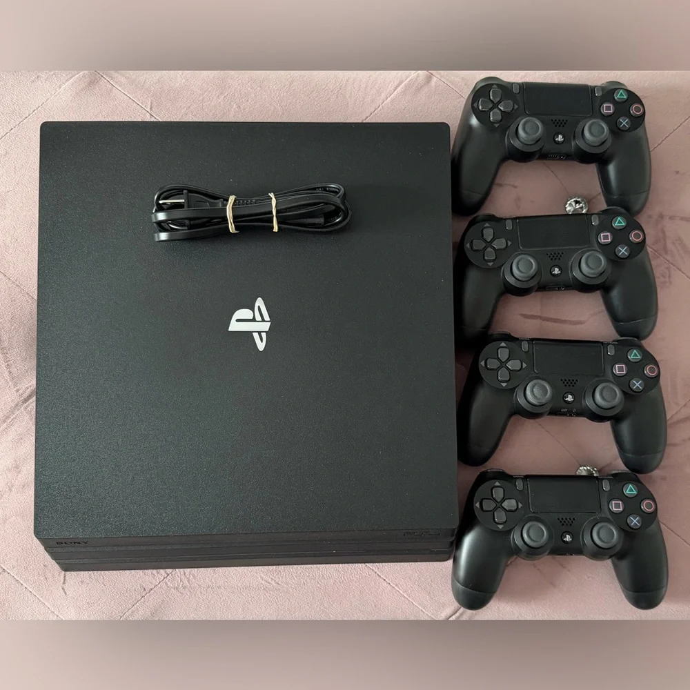 Sony PlayStation 4 Pro 1TB Bundle - 1 Console + 4 Controllers